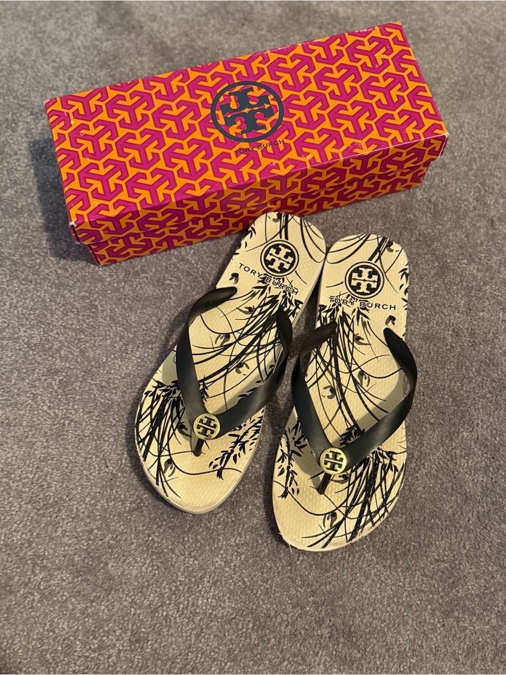 Tory Burch Dark Blue & Cream Logo Flip Flop Sandals with Floral Graphic